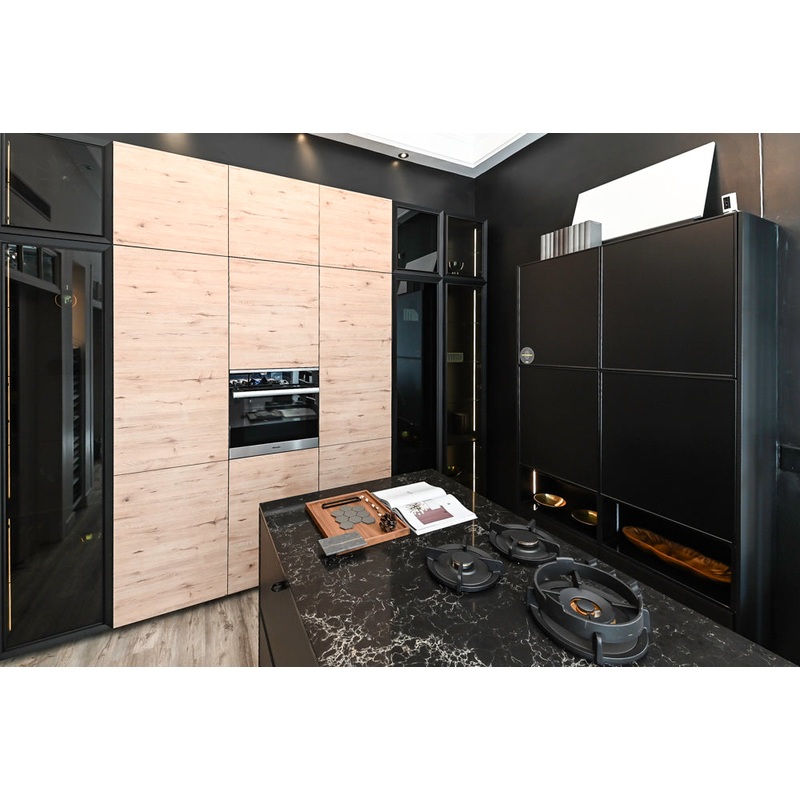 Nolte Kchen Modern Black Kitchen with Unique Accent Wall Cabinetry
