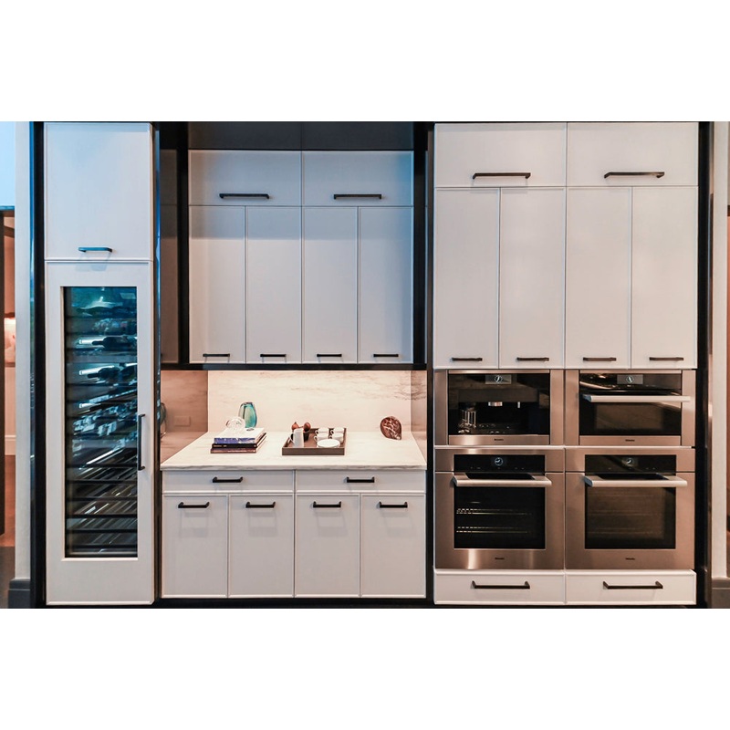 Transitional White Kitchen with Marble Countertops & Miele Appliances