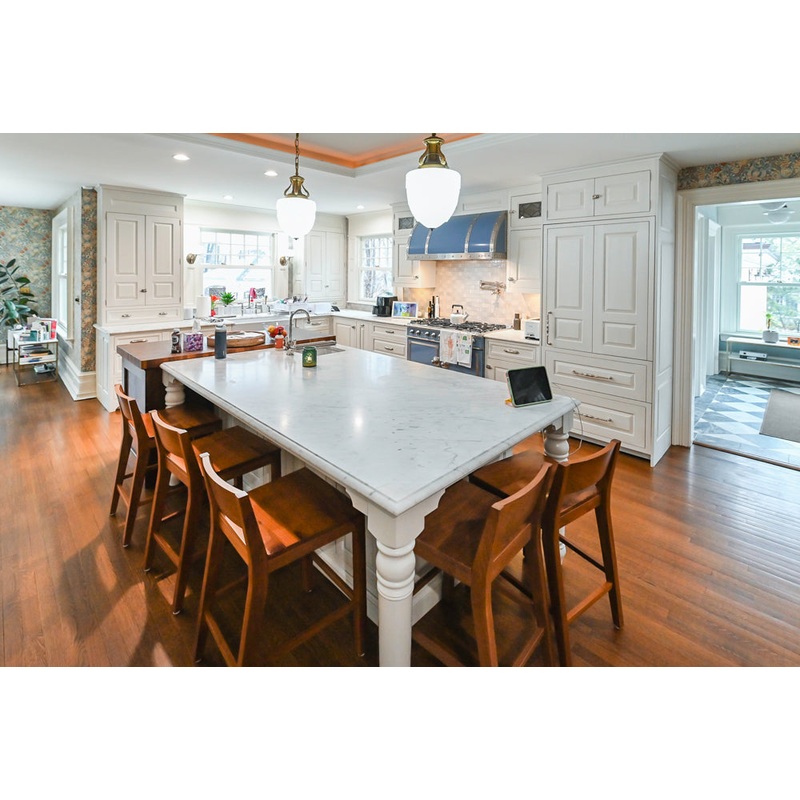 Canterbury Traditional White Kitchen with Island, Marble Countertops and La Cornue Range with Matching Hood