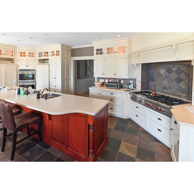 Cronin Cabinets Charm: Traditional White Kitchen with Island & Luxe Appliances