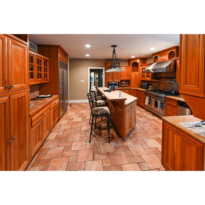 Traditional Wooden Kitchen with Island and Appliances featuring 48″ Viking Range
