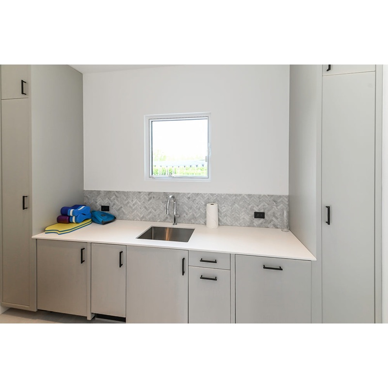 Custom Modern Light Grey Pantry with White Stone Countertops and Stainless Steel Sink
